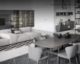 Modernes wohn esszimmer mit beiger Couch, Esstisch und Bücherregalen.