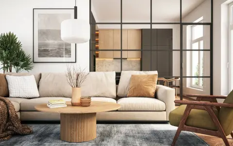 Modernes wohnzimmer einrichten: Beige Couch, Holztisch, grüner Sessel und eine offene Küche hinter Glas.