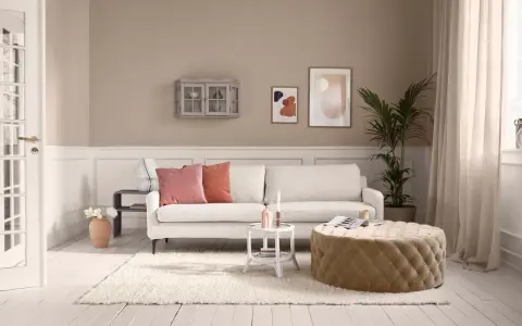 Beige Wände und ein cremefarbener Teppich bilden die Basis. Rosa und Koralle Kissen auf dem Sofa zeigen, welche Farbe passt zu beige: warme Töne.