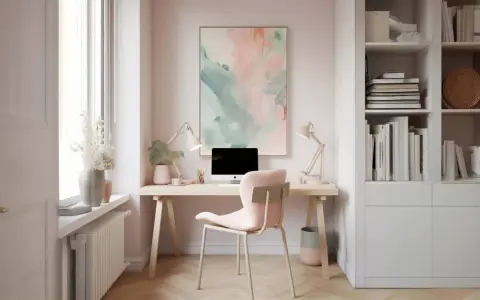 Helle, moderne homeoffice ideen: Schreibtisch mit PC, rosa Stuhl, Bücherregal und Kunstwerk.