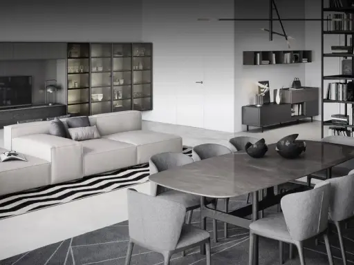 Modernes wohn esszimmer mit beiger Couch, Esstisch und Bücherregalen.