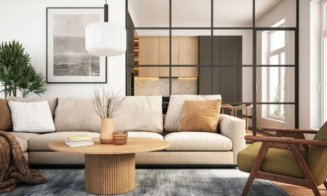 Modernes wohnzimmer einrichten: Beige Couch, Holztisch, grüner Sessel und eine offene Küche hinter Glas.