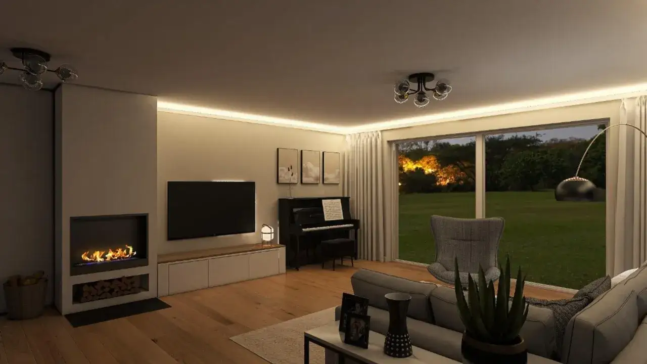 Gem&uuml;tliches Wohnzimmer mit Kaminfeuer, Klavier und Blick ins Gr&uuml;ne &ndash; pure Hygge Bedeutung.